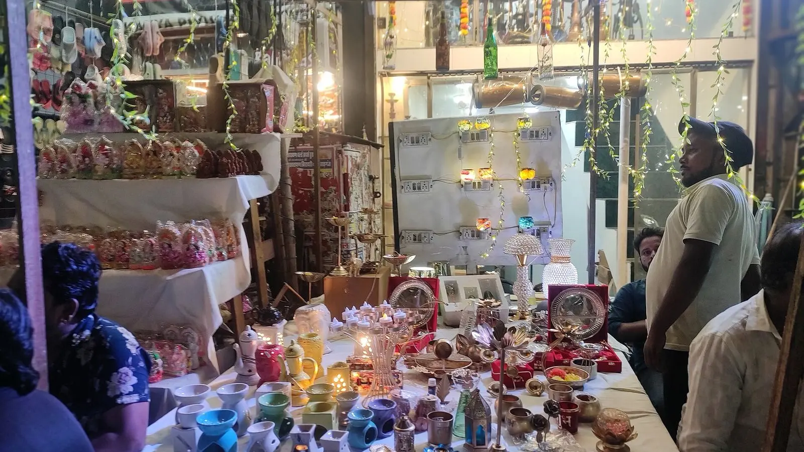 A stall of diyas, candles and Diwali decorations set out at the Diwali market in Paharganj, Delhi